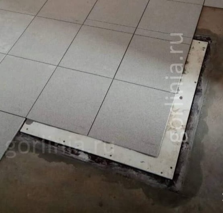 Облицовку плиткой крышки напольного люка Облицовку плиткой крышки напольного люка